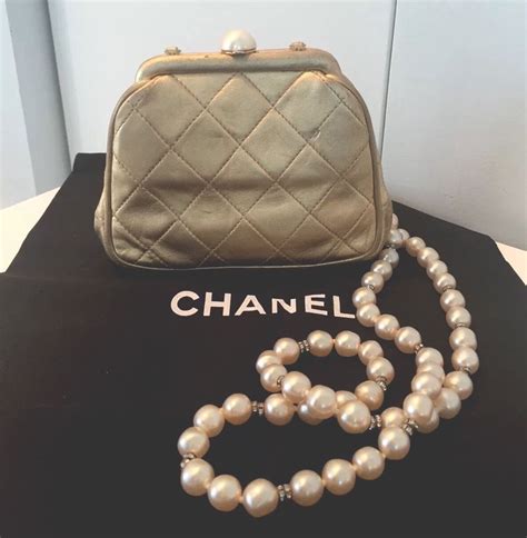 chanel gold pearl bag|chanel bag with pearl chain.